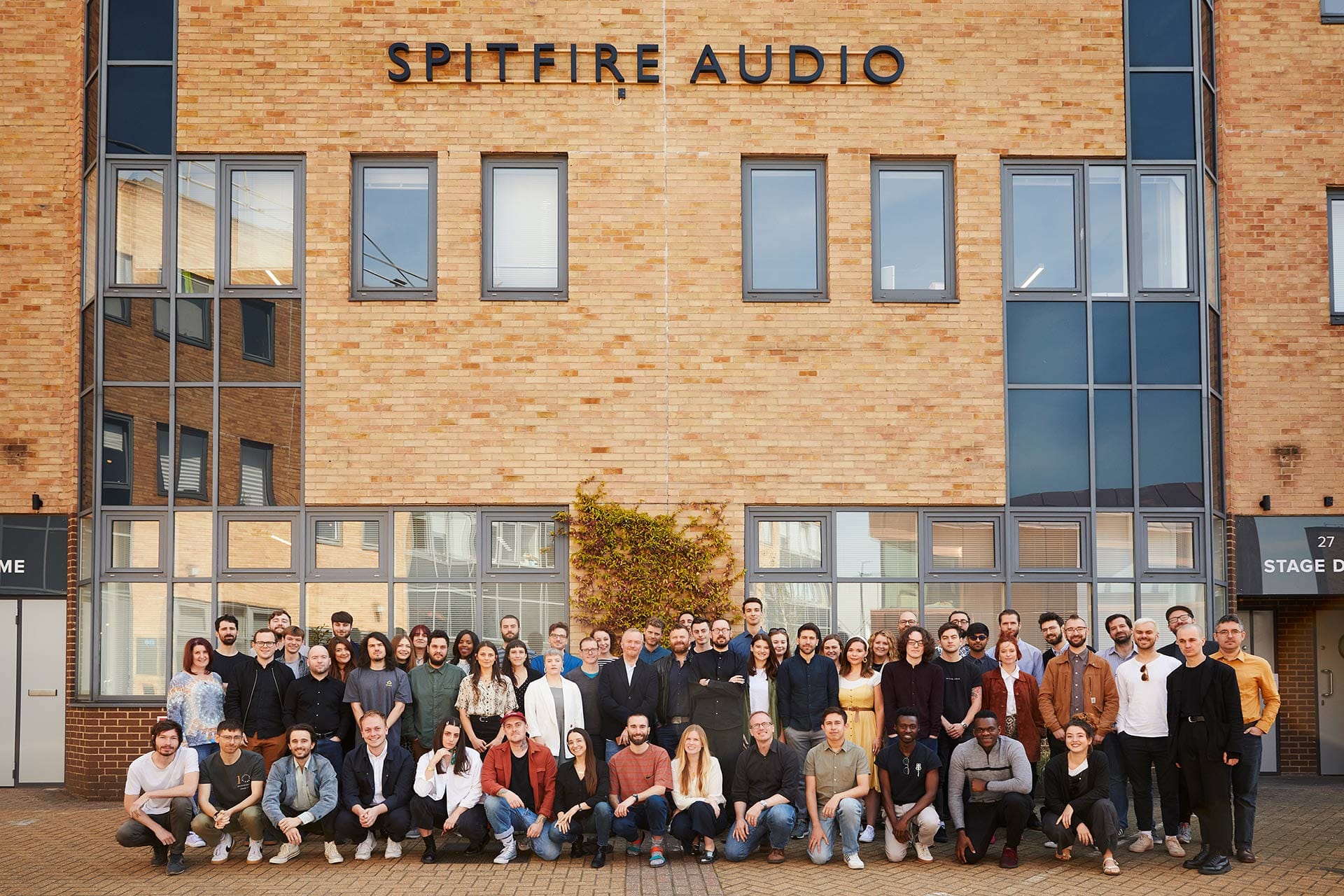 Group shot of employees at Spitfire Audio.