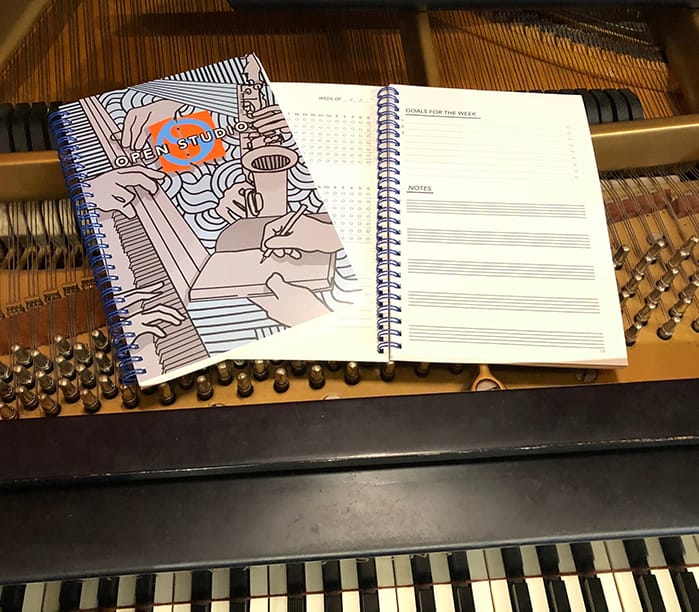 Music Journal laying on a piano